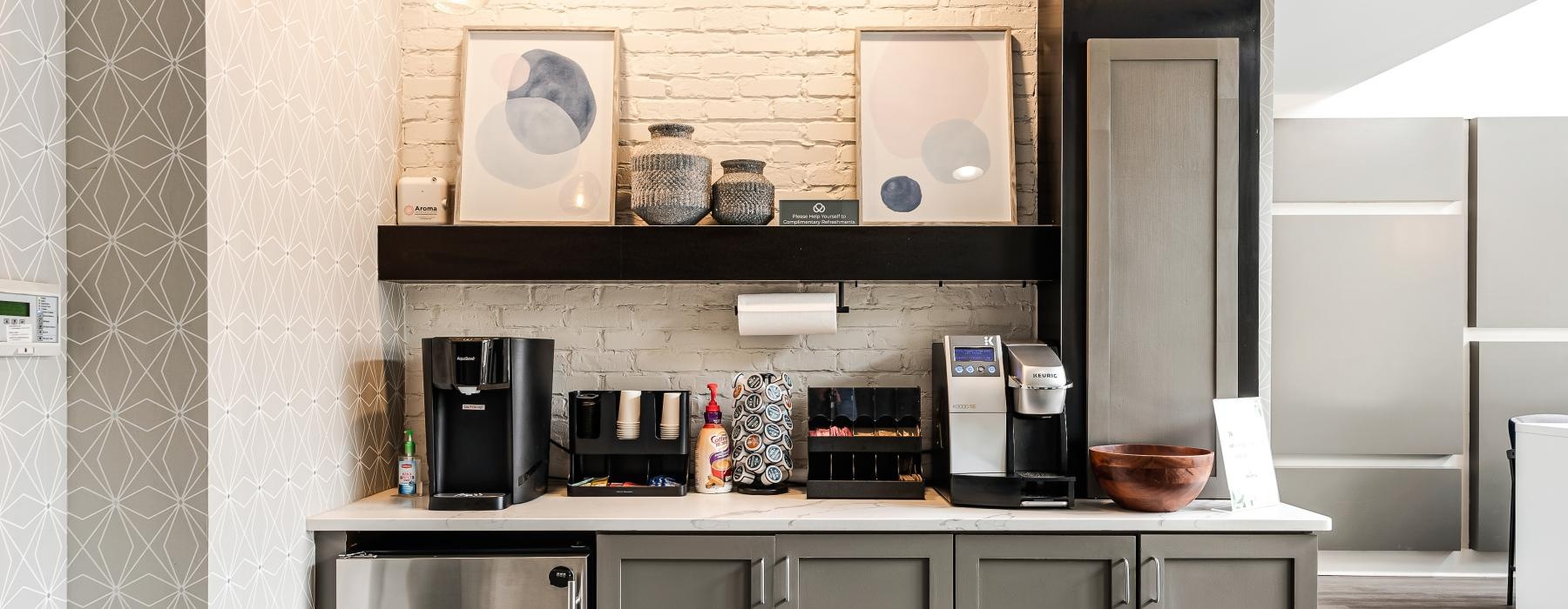 a kitchen with a shelf and cabinets