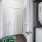 a white door and a laundry area