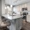 a kitchen with white cabinets
