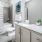 a bathroom with a marble countertop