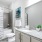 a bathroom with a marble countertop
