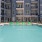 a pool with chairs around it